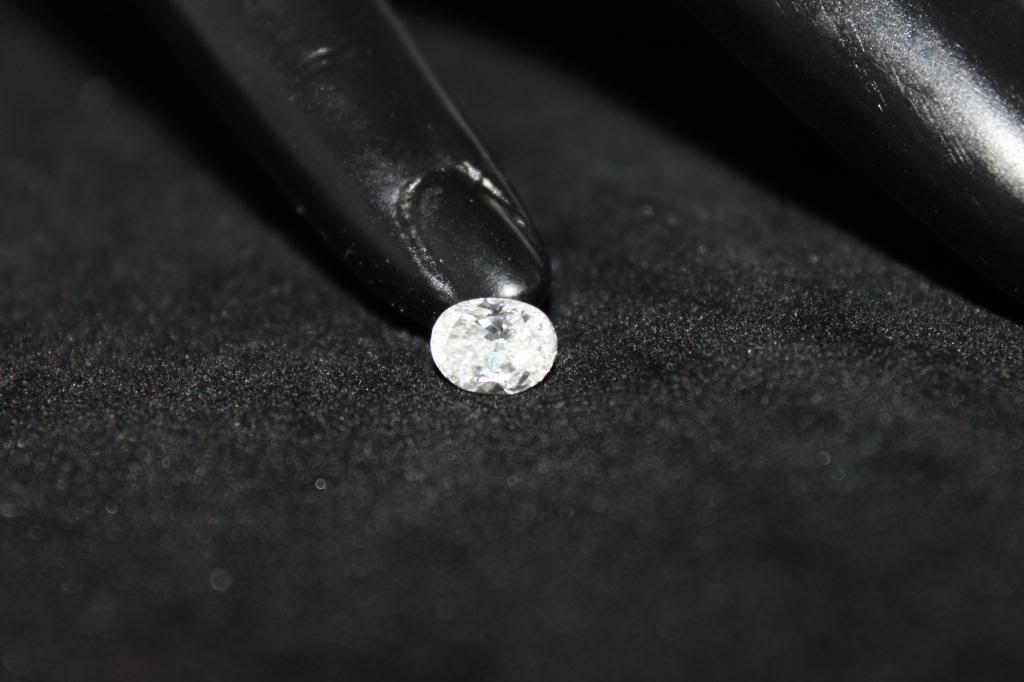 examining diamond carat